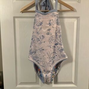 Ladies NWOT reversible 🌸 swimsuit. It’s a sz large and it’s absolutely adorable!